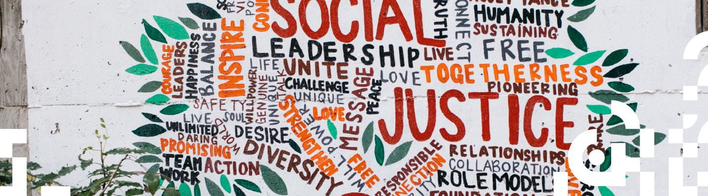 Mural with the words:
Social Justice, Togetherness, Pioneering, Role Model, Free, Diversity, and more...
